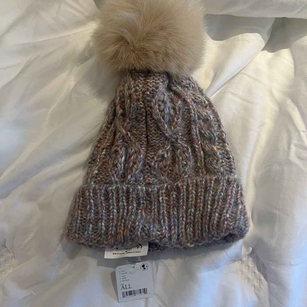 Free people knit colorful hat with Pom Pom. New with tags, never worn
